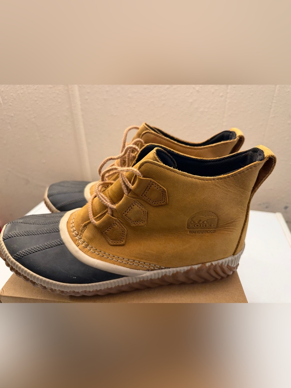 Sorel women’s Waterproof Lace-Up Boots in Mustard and Black